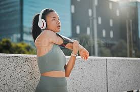 Person exercising while listening to audio.